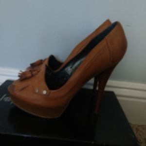 All business tassels peep toe stilettos